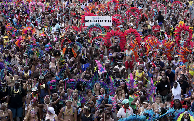 A large group of people in costumes at a carnival