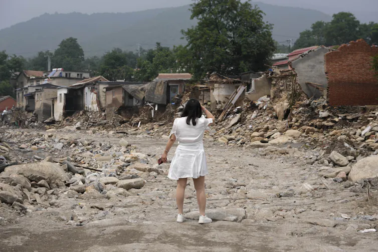 woman after typhoon China