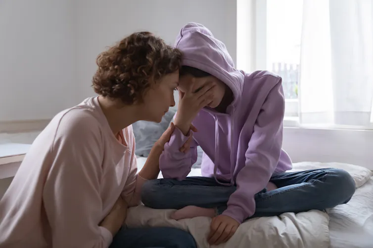 Mother talks to teen