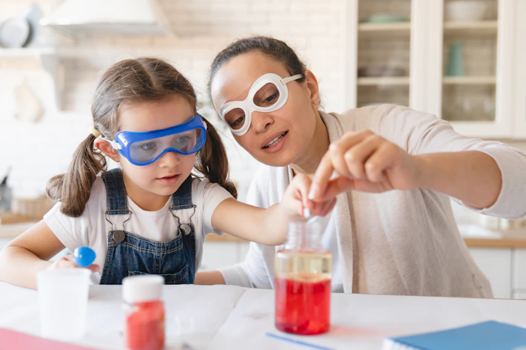 Mother and daughter doing science experiment