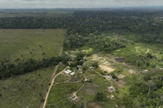 An Indigenous community on the boundaries of a clear-cutting operation.