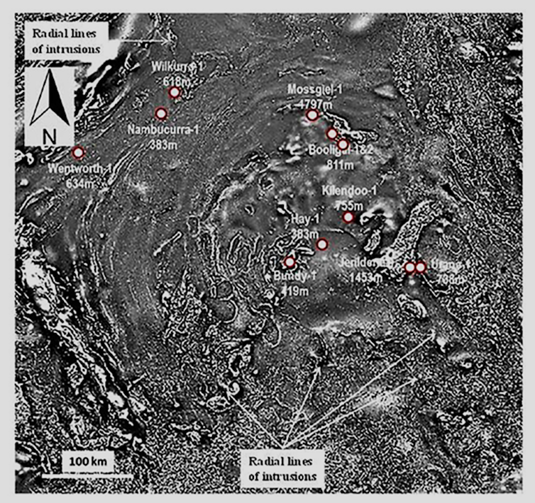 This 'total magnetic intensity' image of the Deniliquin asteroid impact structure portrays its 520-km-diameter multi-ring pattern, the central core, radial faults, and the location of shallow drill holes.