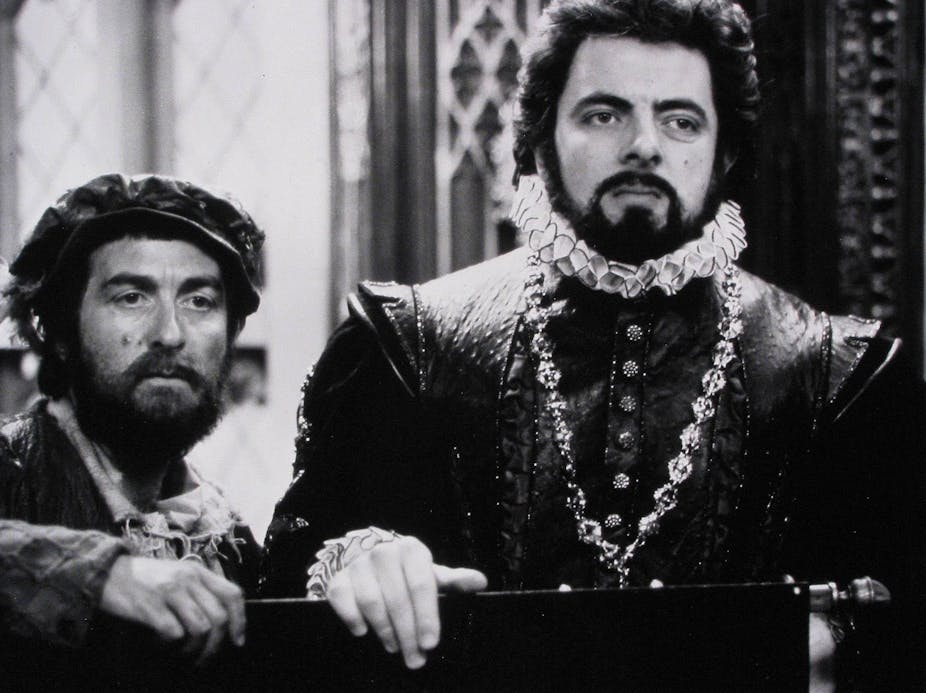 Two men in Elizabethan dress. 