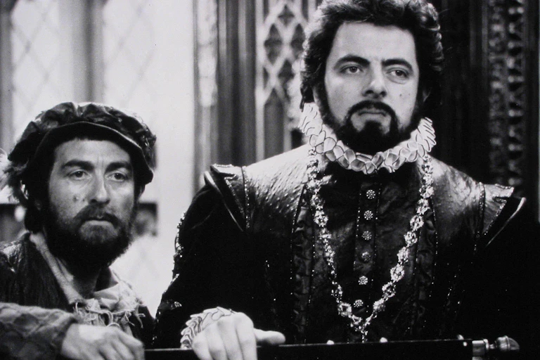 Two men in Elizabethan dress.