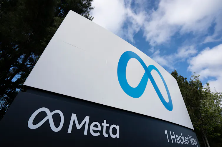 Meta logo on large outdoor sign.