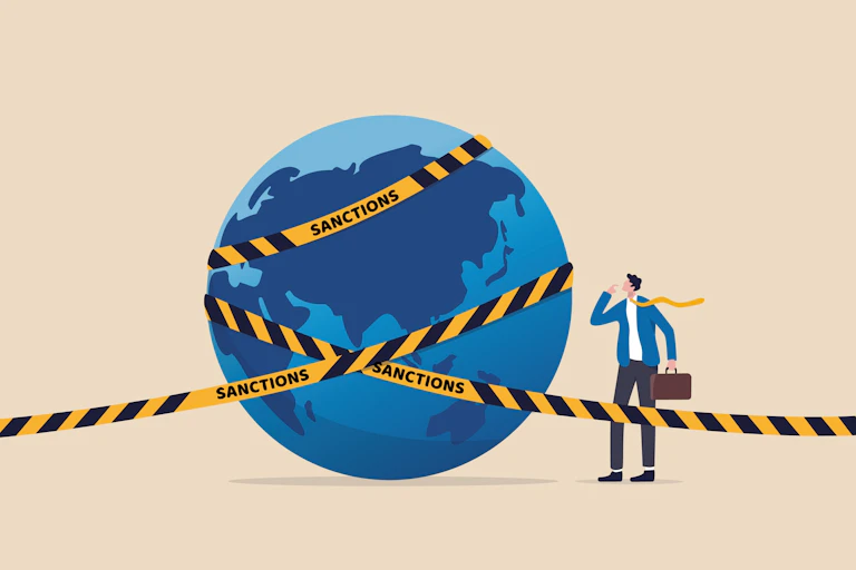 Illustration of the Earth wrapped in black & yellow tape printed with the word "sanctions" beside a person in a suit & tie with a briefcase.