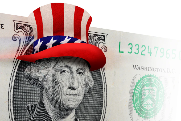 A dollar bill with Washington wearing an Uncle Sam-style hat.