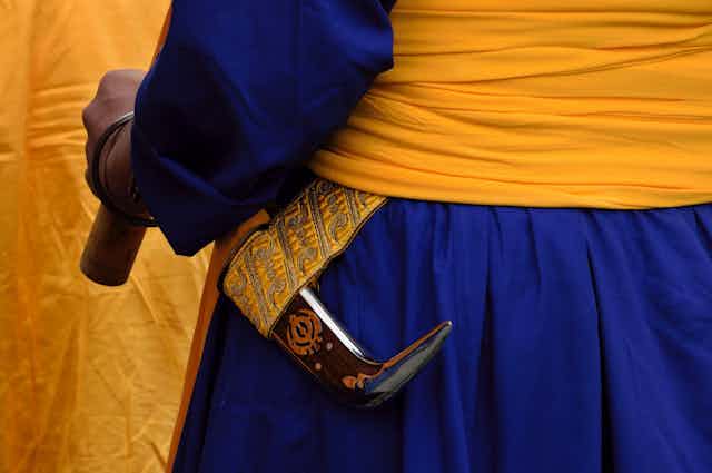 A Sikh man with a kirpan 