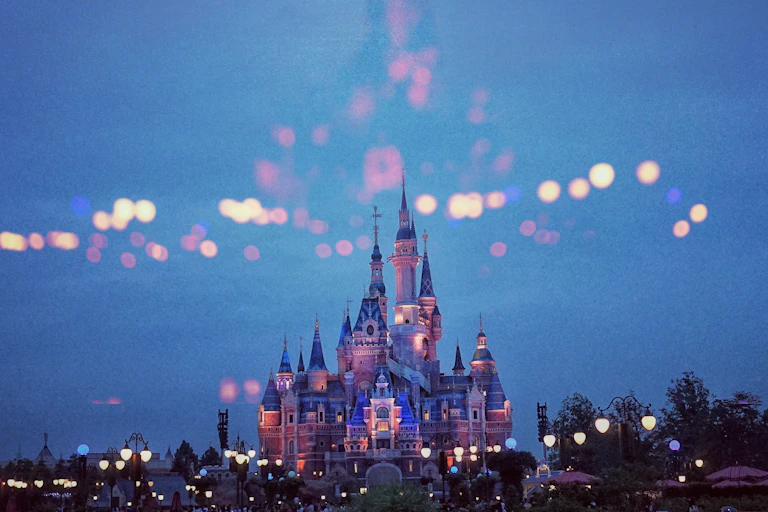 The Disney castle with blurry lights.