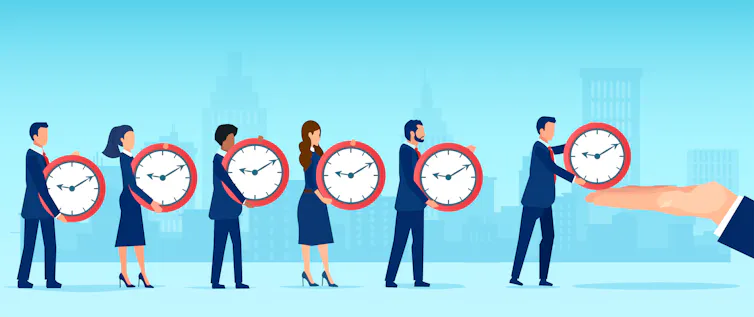 Illustration of a line of people in suits holding clocks, handing them to a large hand at the top of the queue. City skyline in the background.