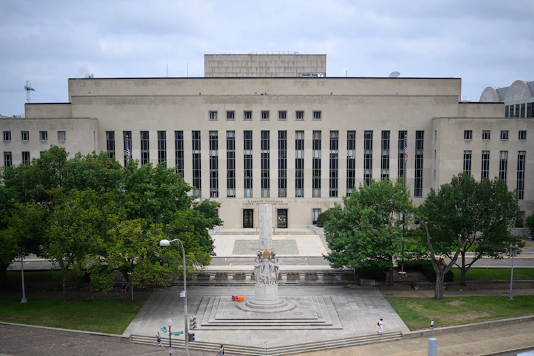 A large, imposing granite building.