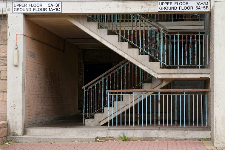 Photo of external stairs on a building of council flats