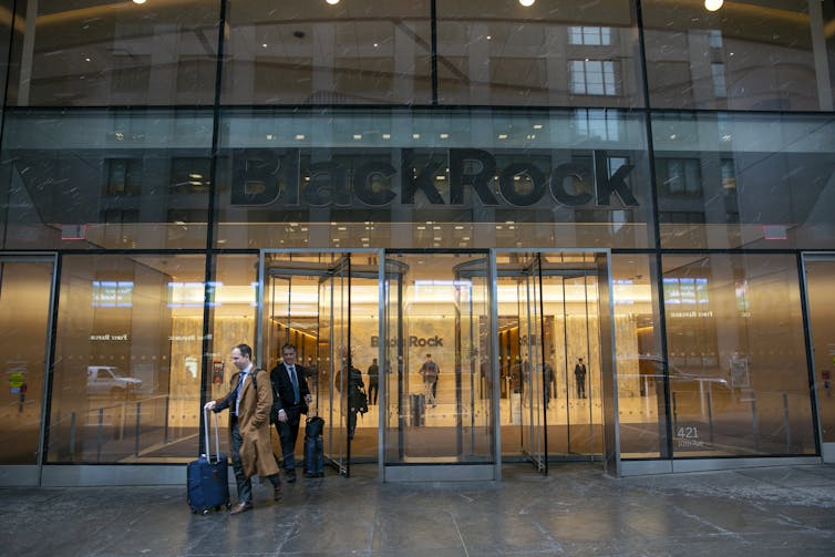 A building with a glass facade and the word Blackrock in capital letters on the front