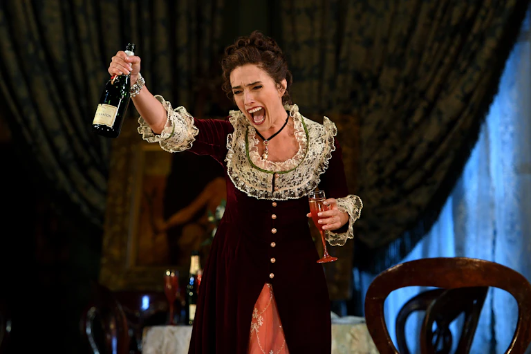 A woman sings.