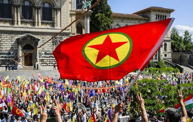 Kurish protesters in Lausanne, Switzerland, with a PKK flag, July 2023.