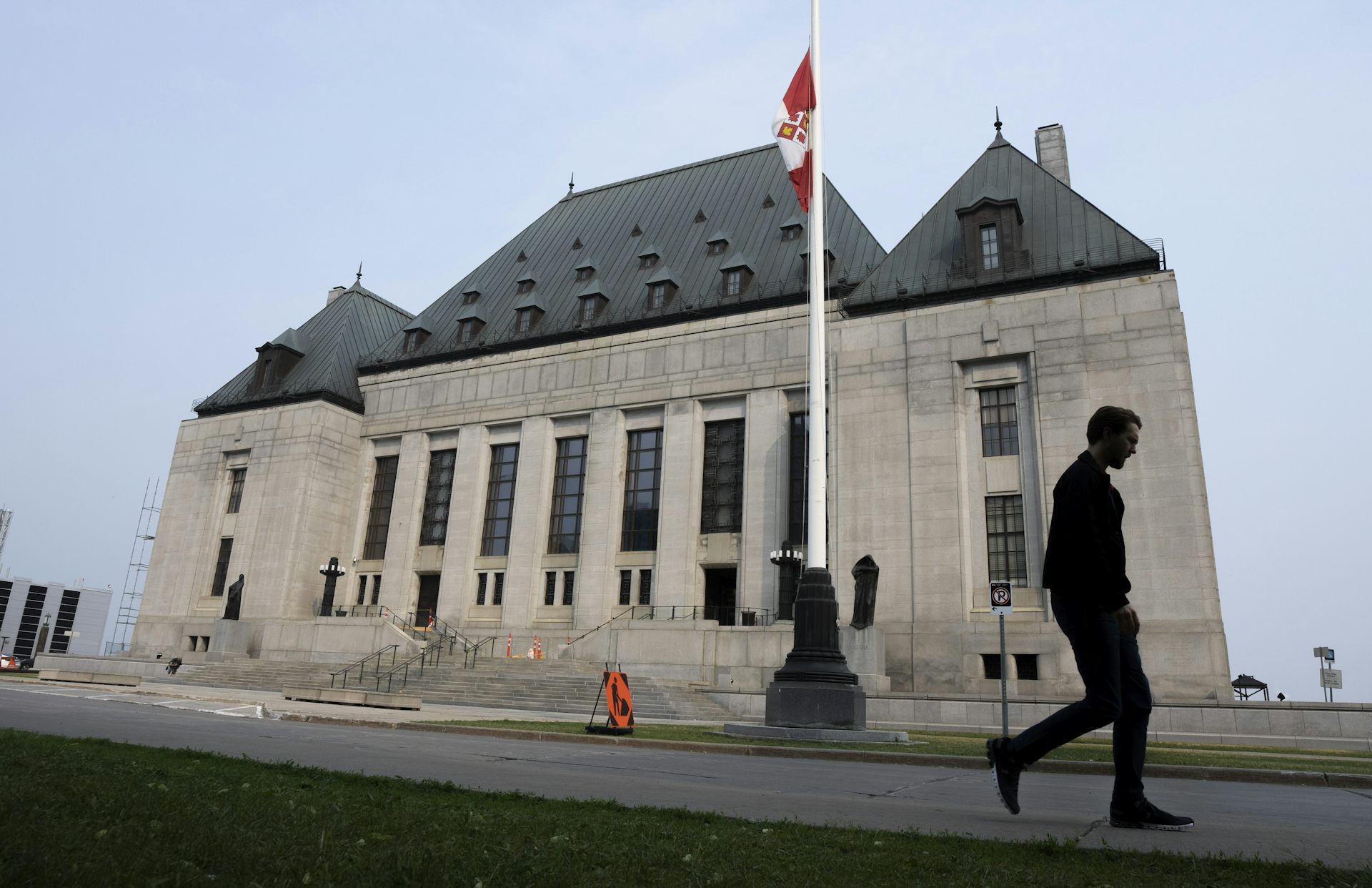 The Supreme Court of Canada seen on an overcast day.