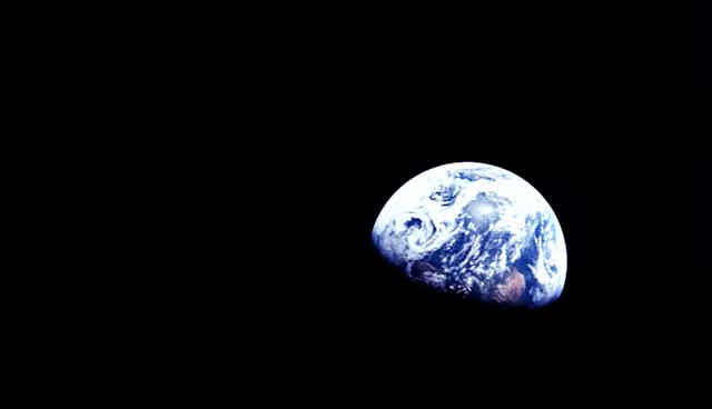 The iconic image of Earth rise taken from the surface of the Moon aboard the Apollo 8 in 1968.
