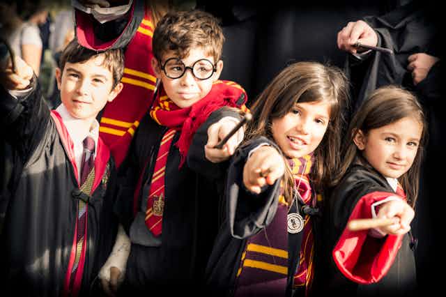 Kids wearing Harry Potter costumes
