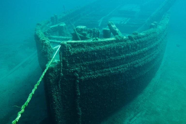 A sunken ship at the bottom of the ocean.