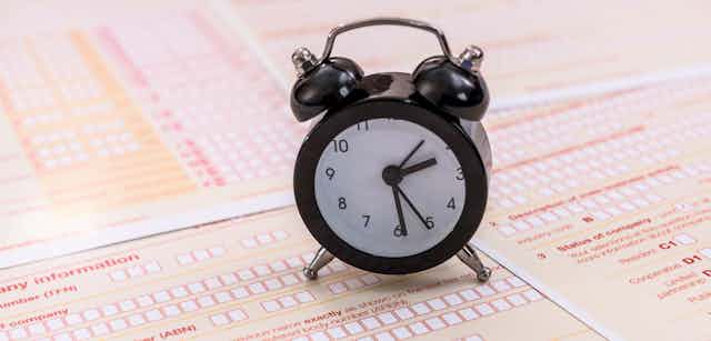 clock on on tax return documents
