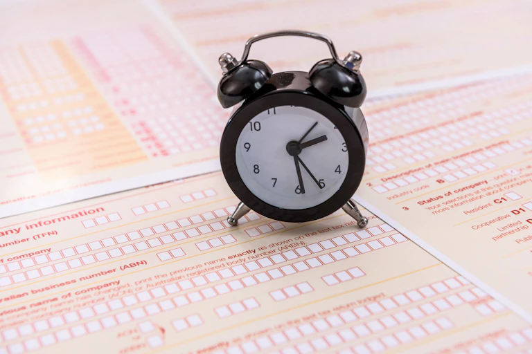 clock on on tax return documents