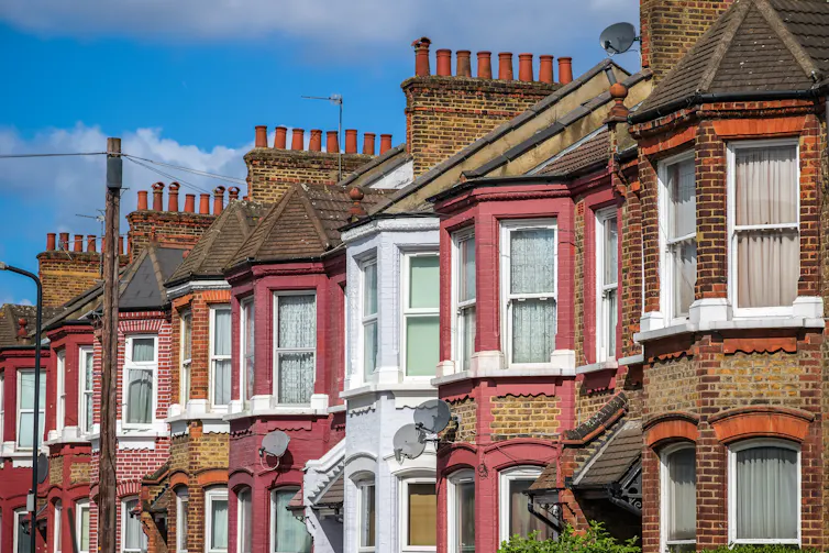 Photo of a row of British terraced houses on a sunny day