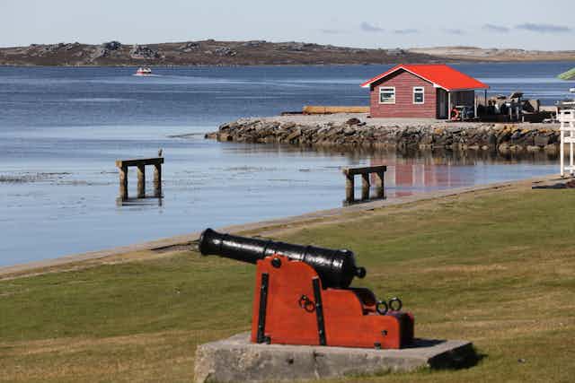 A view of an island with historical armaments. 