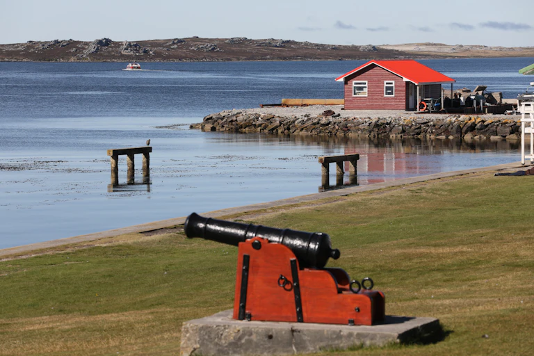 A view of an island with historical armaments.