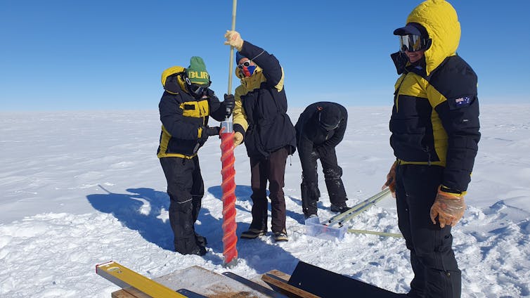 A group of Australian researchers drilling at the million-year-old ice summit in Antarctica