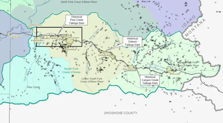 A map is pocked with x's showing mine sites across the region, mostly east of the Bunker Hill fire site.