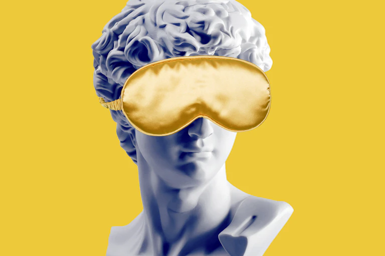 Head of Ancient Greek or Roman statue wearing eye mask