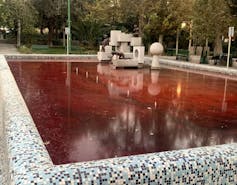 A pool of red water.