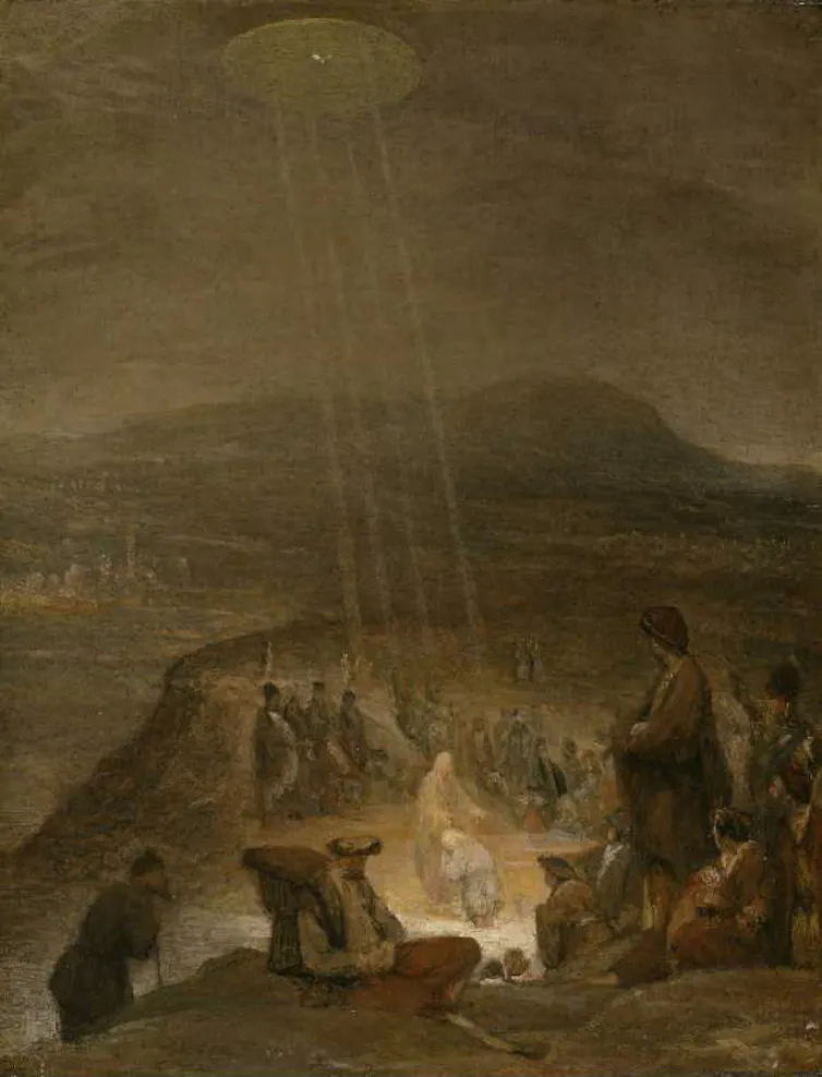 A UFO shines down on Jesus