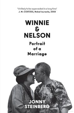 Book cover shows a man and woman kissing.