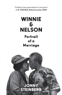 Book cover shows a man and woman kissing.