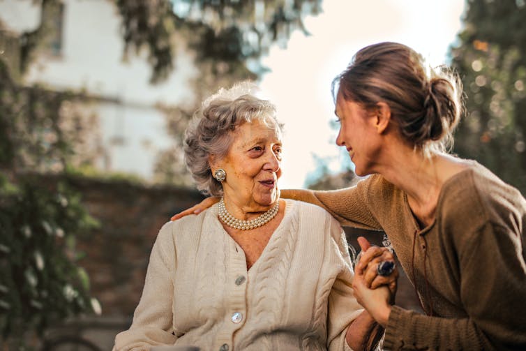 Two women, old and young spending time together.