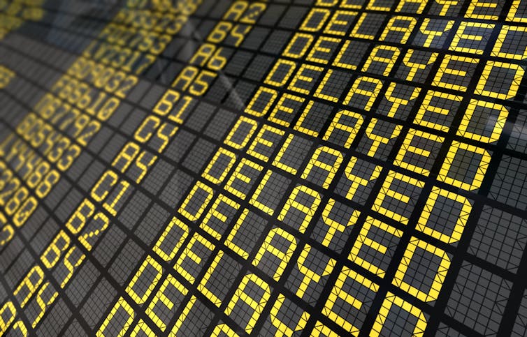 Airport flight information board with