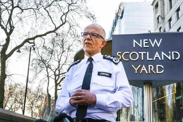 Met Commissioner Mark Rowley stands outside New Scotland Yard, speaking to press.