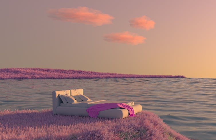 bed in pink landscape