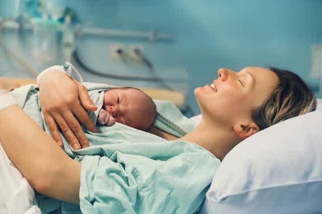 Mum with newborn baby on chest