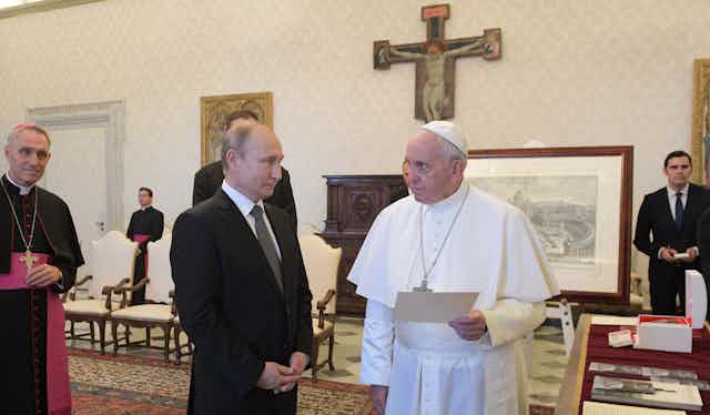Russian president Vladimir Putin with Pope Francis at the Vatican, 2019.