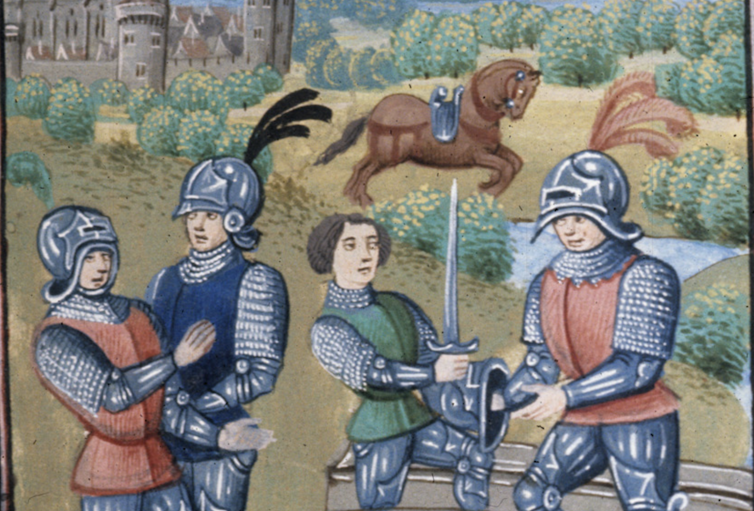 Four knights battling in front of a castle.