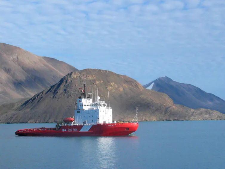 A Canadian ice breaker seen before an island in Lancaster Sound.