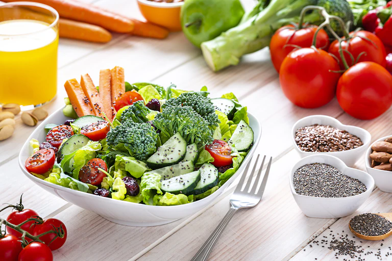A bowl of vegetables, with some grains