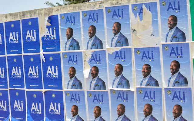Election posters for Gabonese president Ali Bongo on a wall in the capital Libreville.