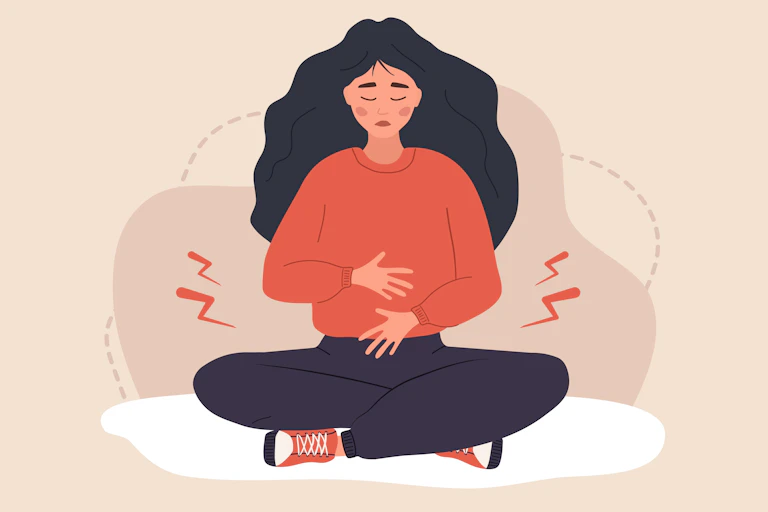 A cartoon drawing of a woman holding her stomach in pain.