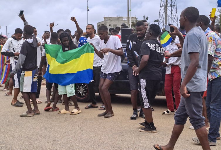 People demonstrate in favour of the military coup in the Gabon capital, Libreville.