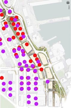 A map of a city area with large red and purple dots.