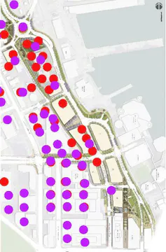 A map of a city area with large red and purple dots.