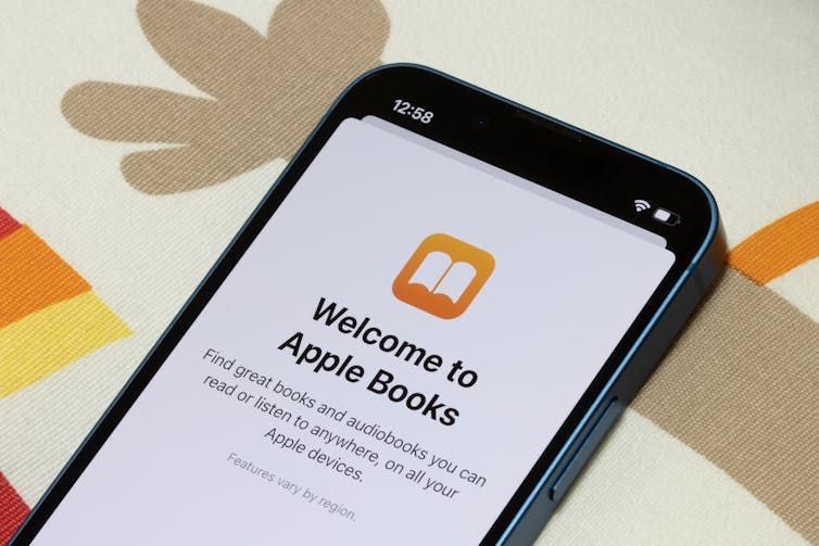 An iPhone screen displaying the words: 'welcome to Apple Books'.